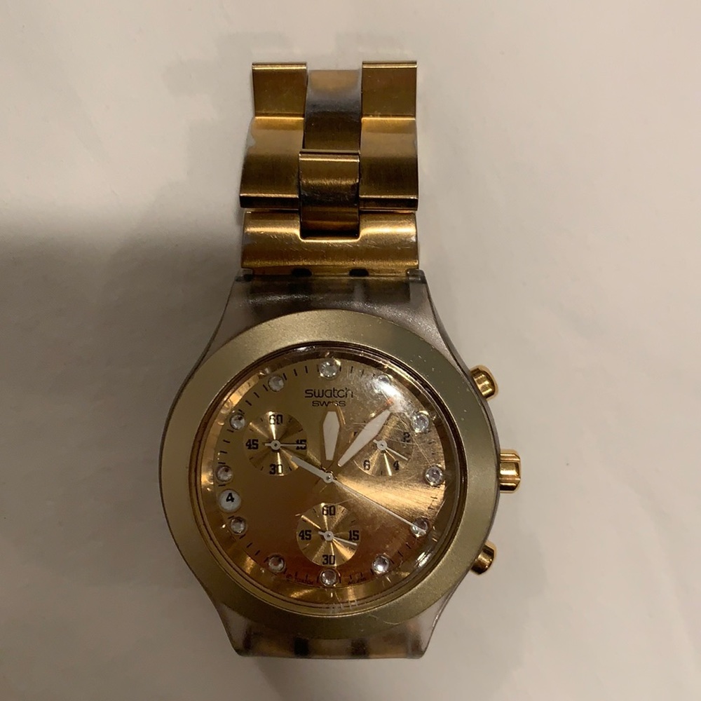 Unisex swatch watch in gold